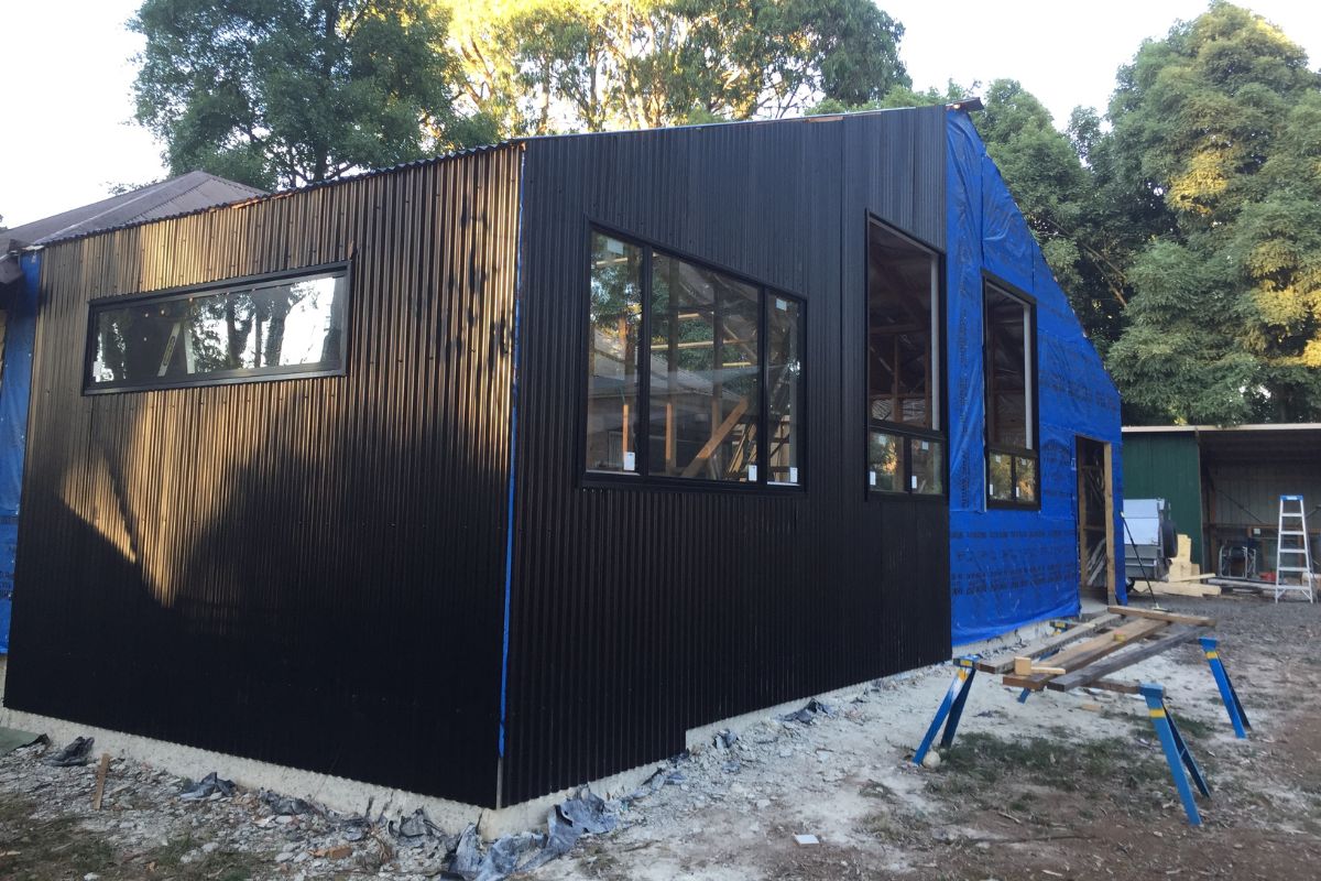 Black Colorbond extension on a weatherboard home, Kinglake
