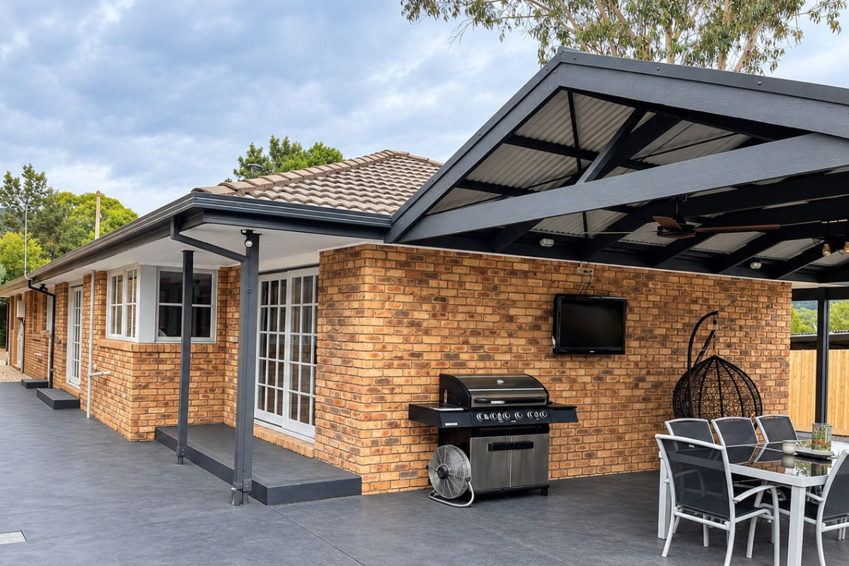 Landscaped outdoor entertaining area with retaining walls, Yarra Junction