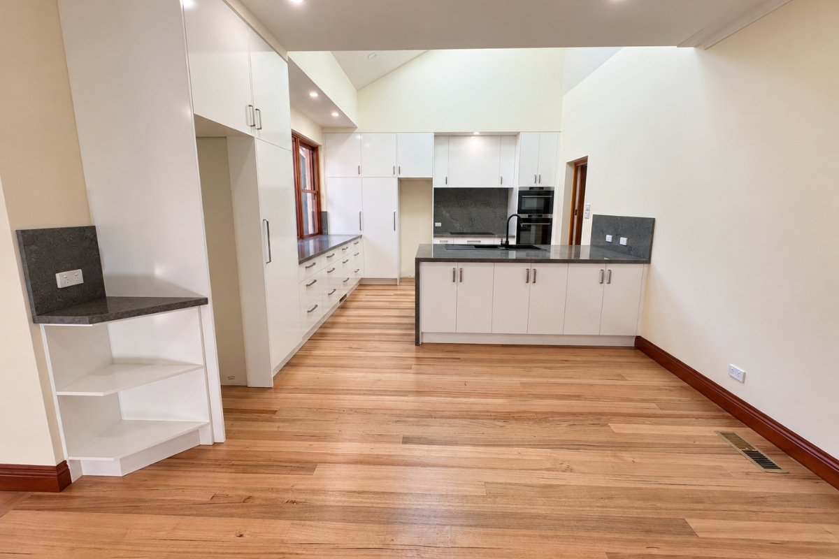 Irymple Street, St Kilda 1200w Vaulted ceiling with skylights over an open kitchen and living area, St Kilda